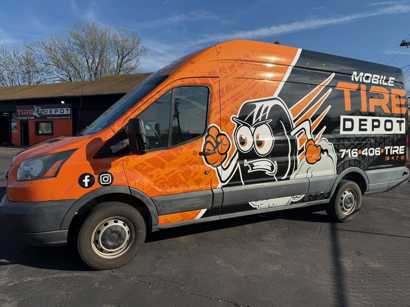 Mobile Tire Depot orange and black service van with tire mascot, Buffalo NY